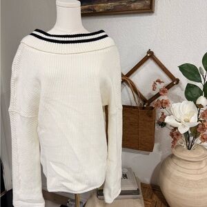 The Frankie Shop Off-the-Shoulder Cream Sweater with Black Trim